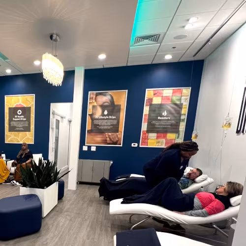 Client relaxing in the lounge area after completing IV therapy