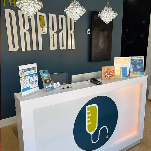 Front desk staff assisting clients with scheduling and inquiries